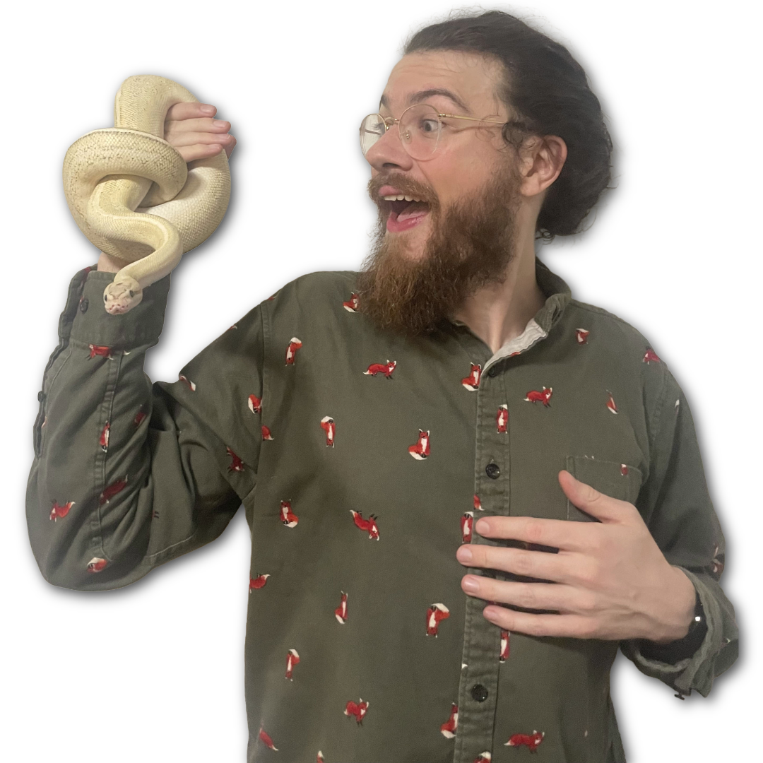 Tim DiFazio holding a snake for Creature Club
